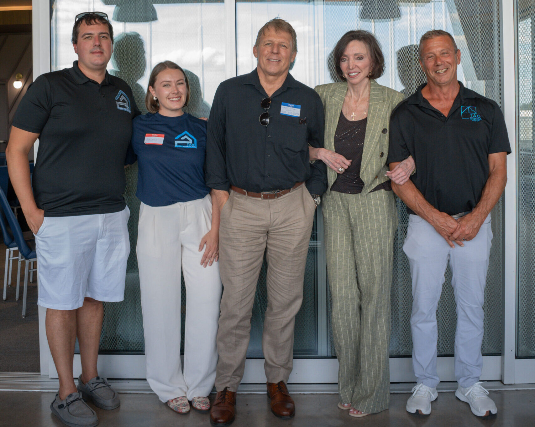 The Triangle Appraisal Group team with partners at The Road to Success Tour event at Topgolf Durham.